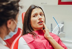 Woman at dentist with toothache