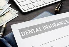 Dental insurance paperwork for the cost of dental implants in Forest