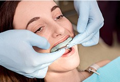 Patient being fitted for oral appliance