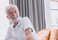 Man laughing with dentures