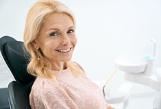 Woman smiling in the dental chair