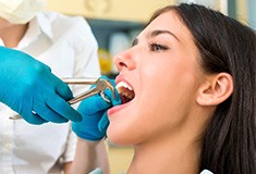 Patient having tooth removed