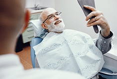 Man smiling in dental chair