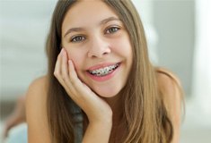 tween girl with metal braces 