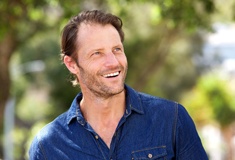 Man smiling outside