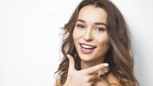 Smiling woman with whitened teeth