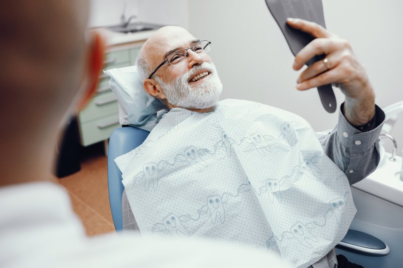 Man smiling at the dentist