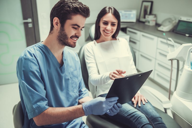 patient at dental implant consultation in Forest 